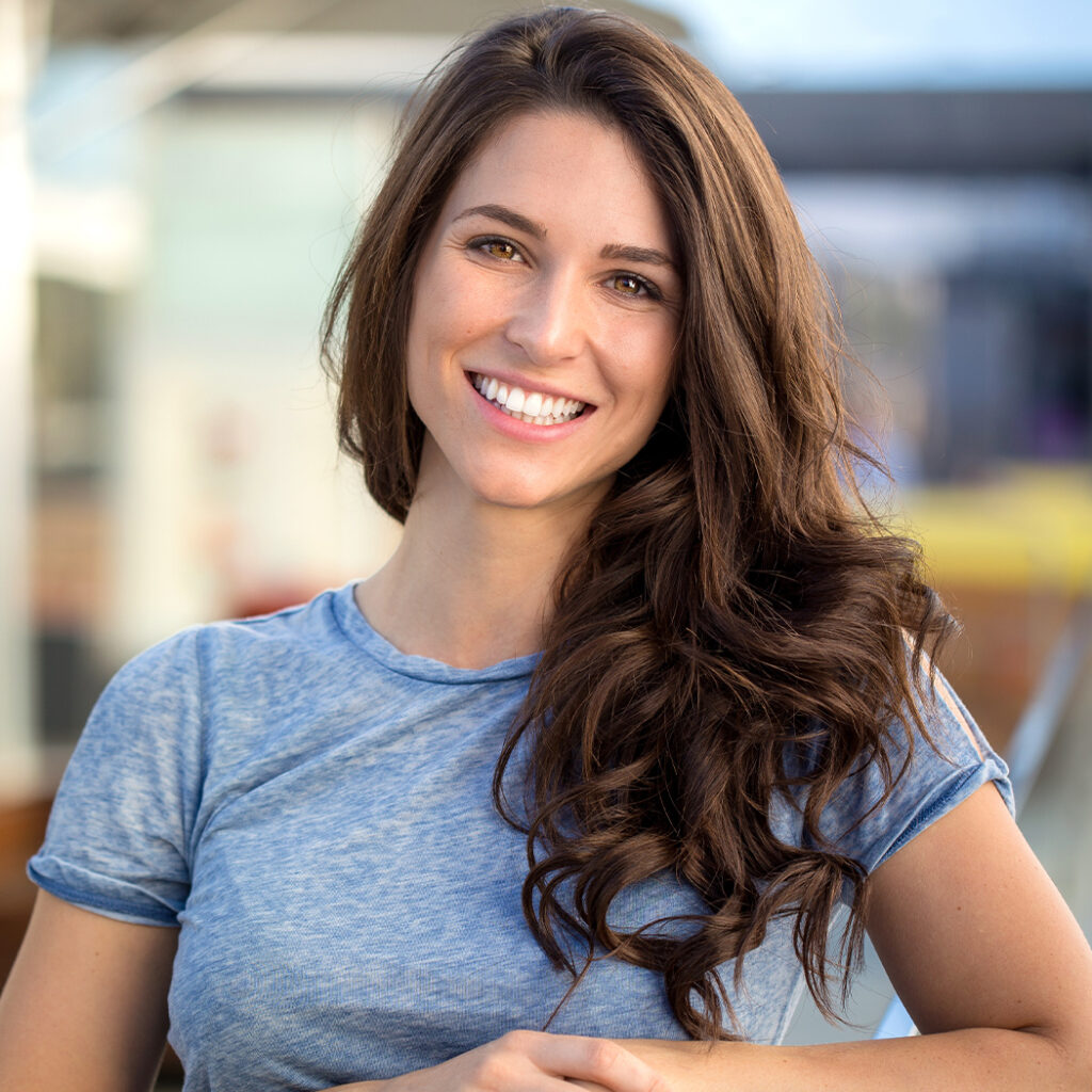 Photo of a brunette woman with good skin